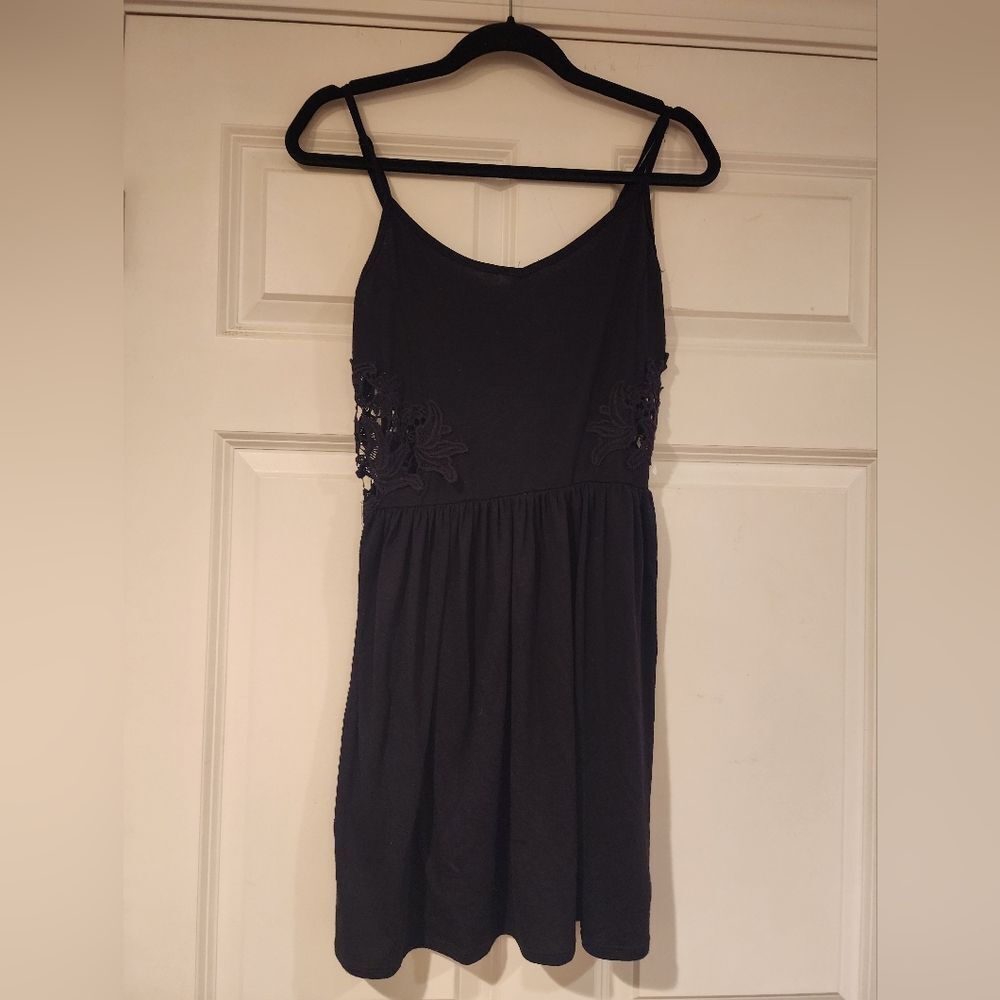 Stretchy black mini dress with midsection cutout M Juniors